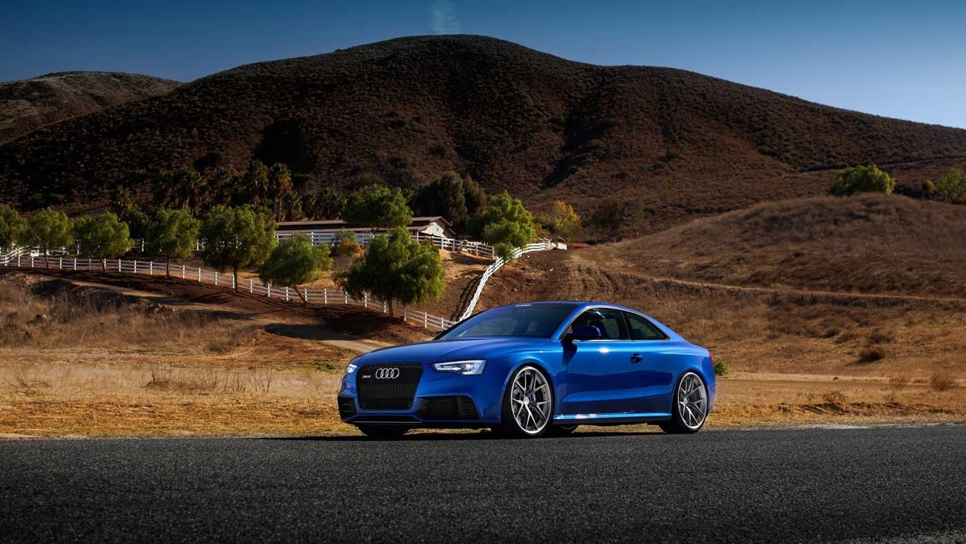 blue audi RS5 countryside